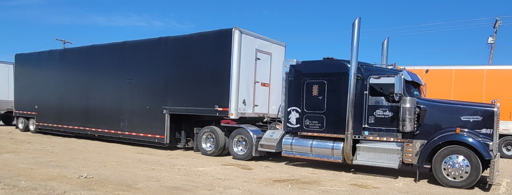 Side view of a semi and trailer